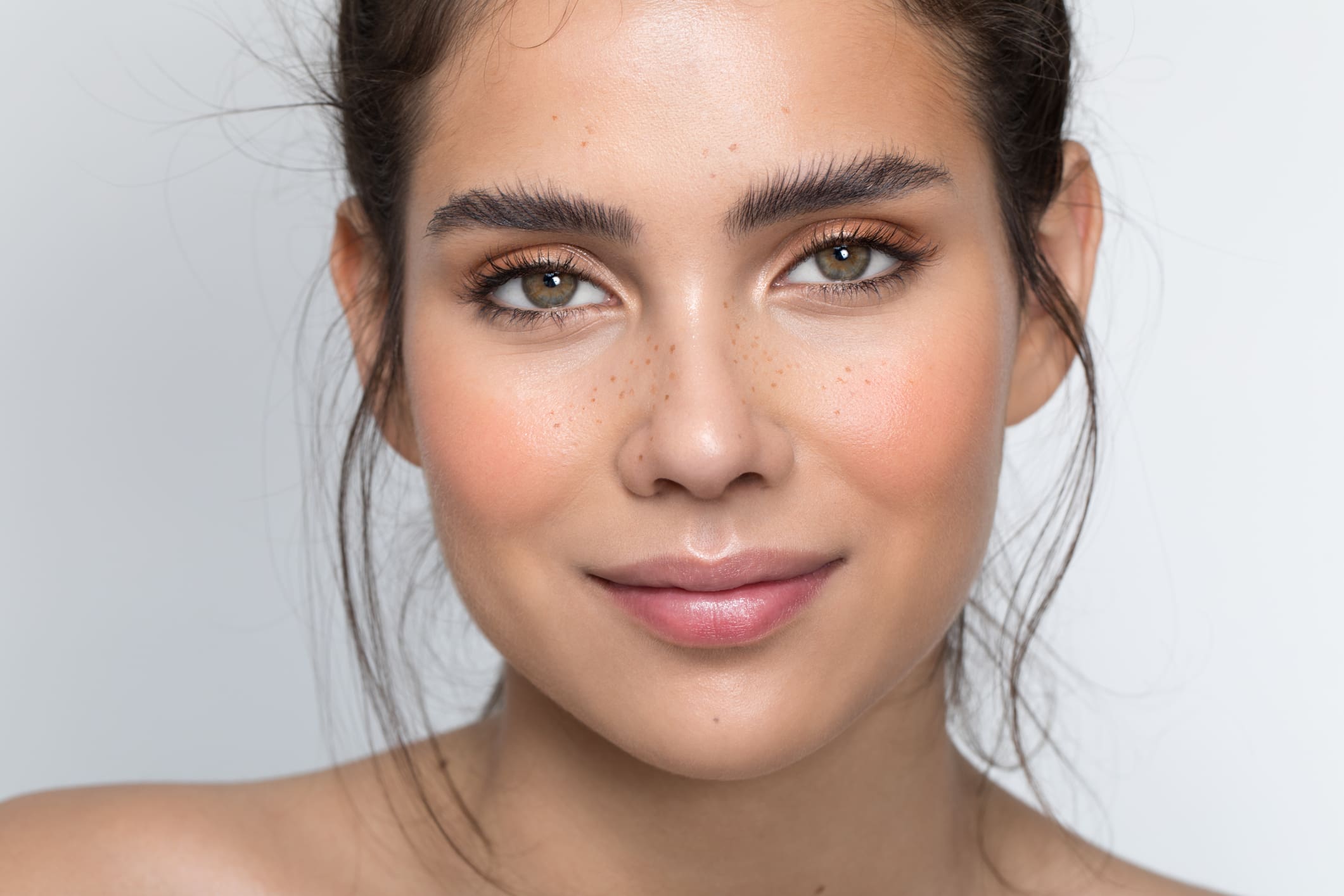 Close-up of woman with soft makeup