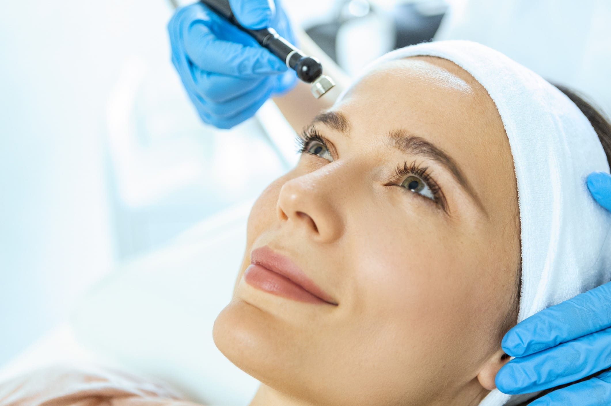 Woman receiving skincare treatment